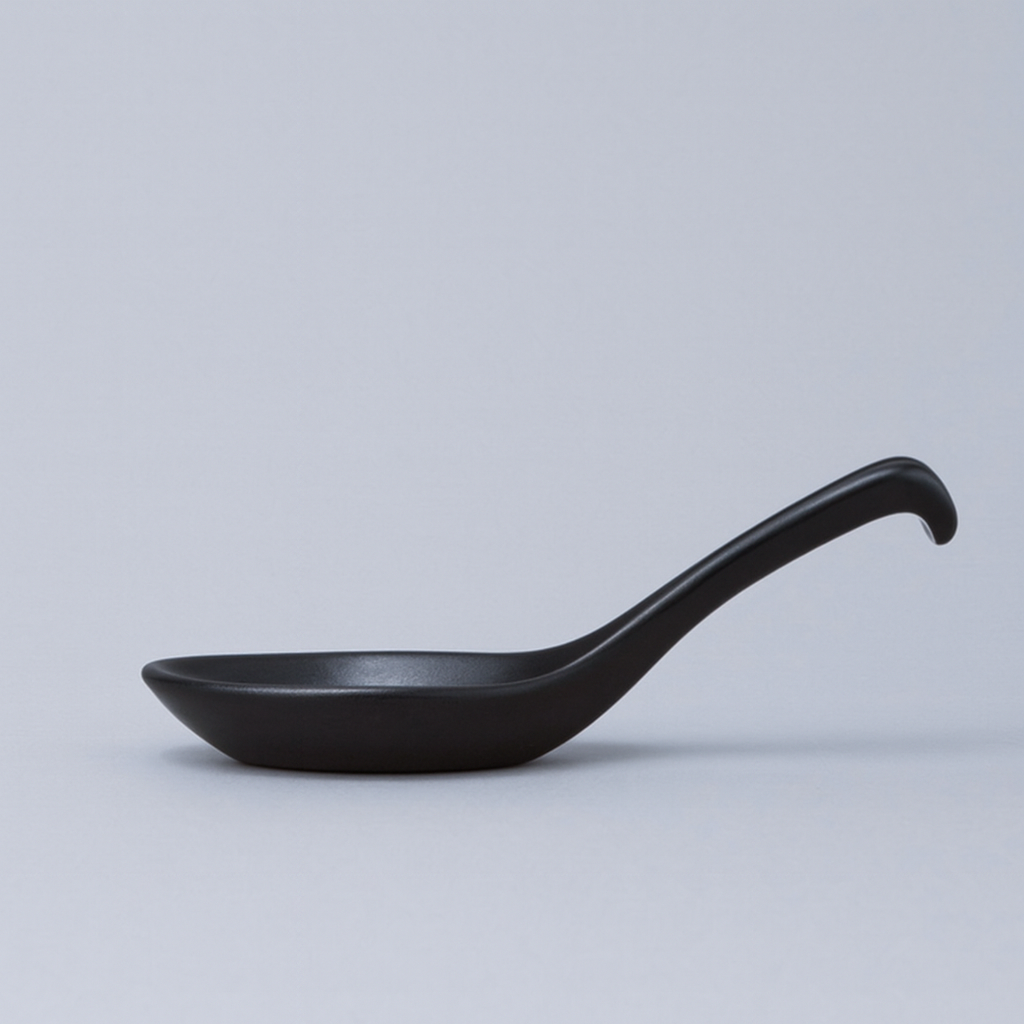Japanese porcelain renge noodle spoon in matt black glaze.