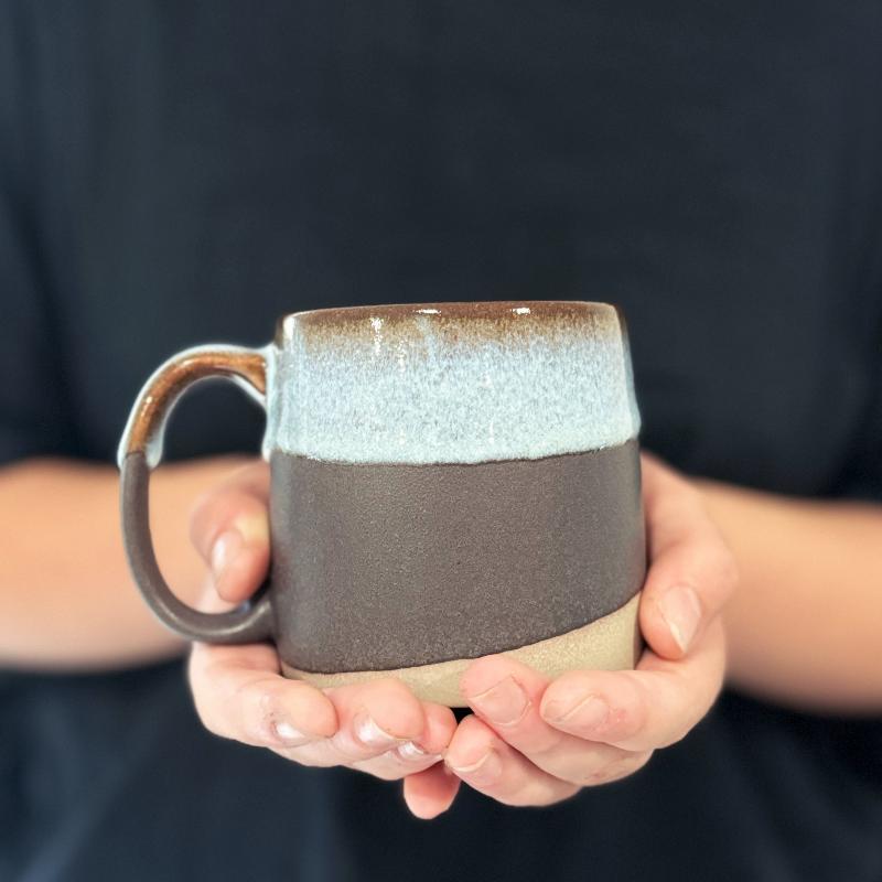 Handcrafted large porcelain TOKA mug in black with a large handle. Made in Japan.