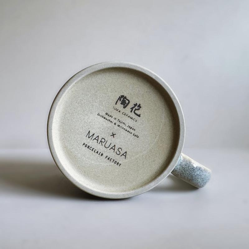 Base of a TOKA Japanese ceramic mug in grey glaze showing the authentic Maruasa Porcelain Factory maker's mark, Mino ware.