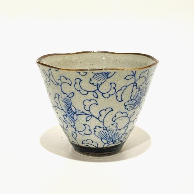Japanese tea cup in blue floral pattern. Mino ware, made in Japan. Available at Toka Ceramics.