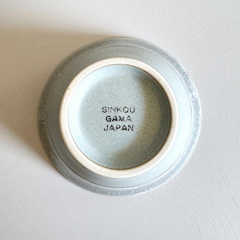 Icicle medium bowl: Crafted by Sinkogama in Mino, Gifu, Japan. Unique glaze captures nature's beauty. Elevate your space with this handcrafted masterpiece.